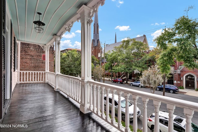 balcony featuring covered porch