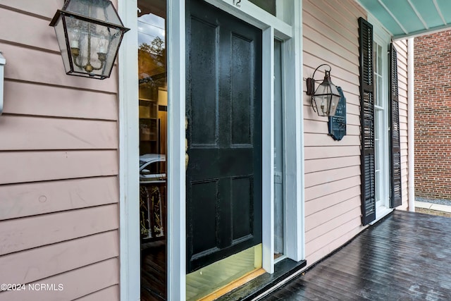 entrance to property with a porch