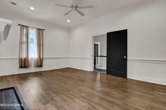 unfurnished room featuring crown molding, hardwood / wood-style flooring, and ceiling fan