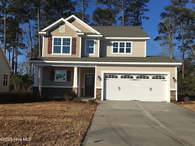 craftsman house with a garage