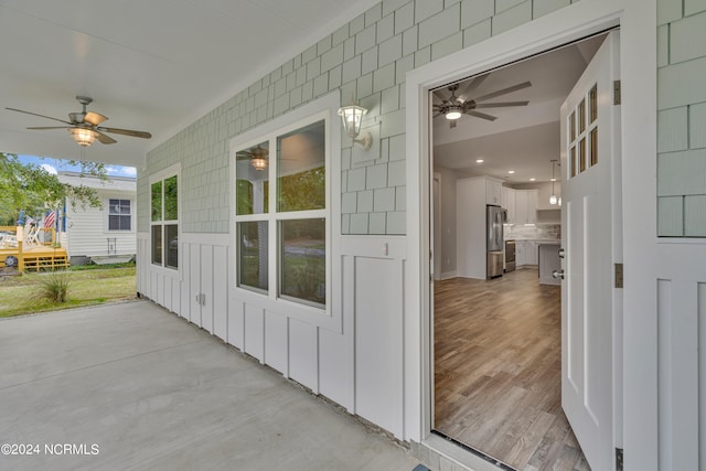 view of patio / terrace featuring ceiling fan