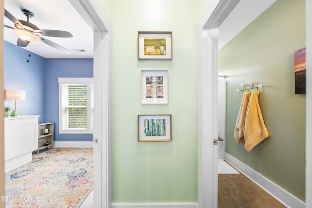 1305 Mackerel Ln Unit 1, Carolina Beach, NC 28428 - bathroom featuring ceiling fan and tile patterned floors