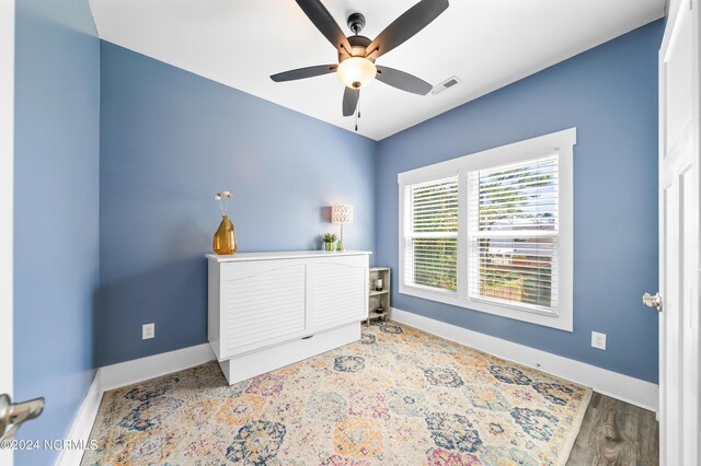 1305 Mackerel Ln Unit 1, Carolina Beach, NC 28428 - home office with a ceiling fan and baseboards