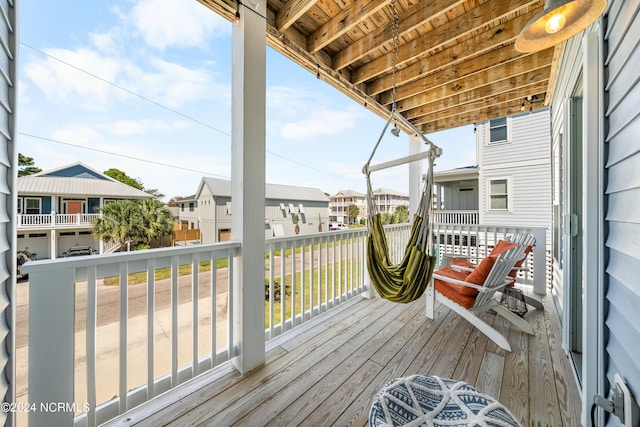 1305 Mackerel Ln Unit 1, Carolina Beach, NC 28428 - wooden deck featuring a residential view