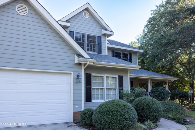 view of front of property featuring a garage