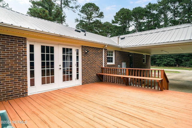 wooden deck featuring french doors