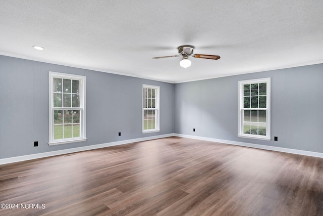 unfurnished room featuring a textured ceiling, wood-type flooring, and ceiling fan