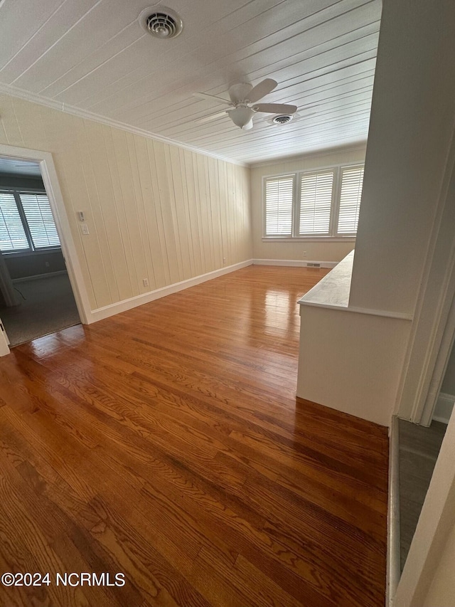 spare room with ceiling fan and hardwood / wood-style floors