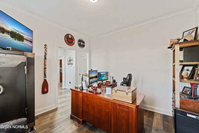 office featuring ornamental molding, a textured ceiling, and dark hardwood / wood-style flooring