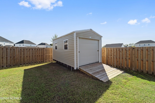 view of outdoor structure with a yard