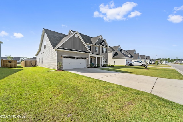 view of front facade with a garage and a front lawn