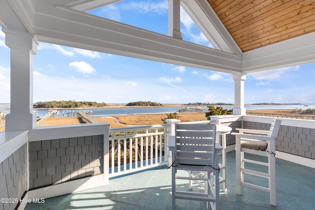 view of patio featuring a water view