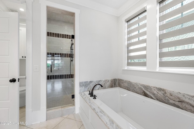 bathroom featuring ornamental molding, plenty of natural light, independent shower and bath, and tile patterned flooring