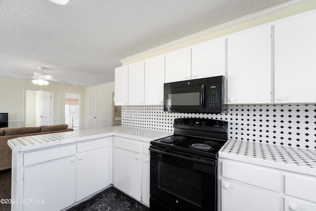 kitchen featuring ceiling fan, white cabinets, kitchen peninsula, black appliances, and tile countertops