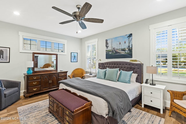 bedroom featuring wood-type flooring and ceiling fan