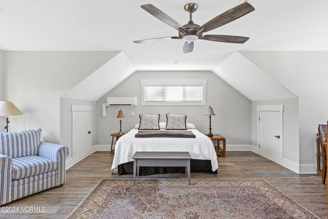 bedroom featuring vaulted ceiling, an AC wall unit, hardwood / wood-style floors, and ceiling fan