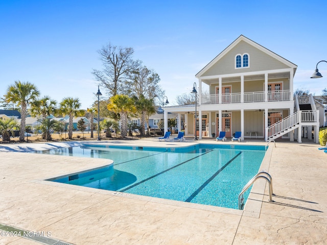 view of pool featuring a patio