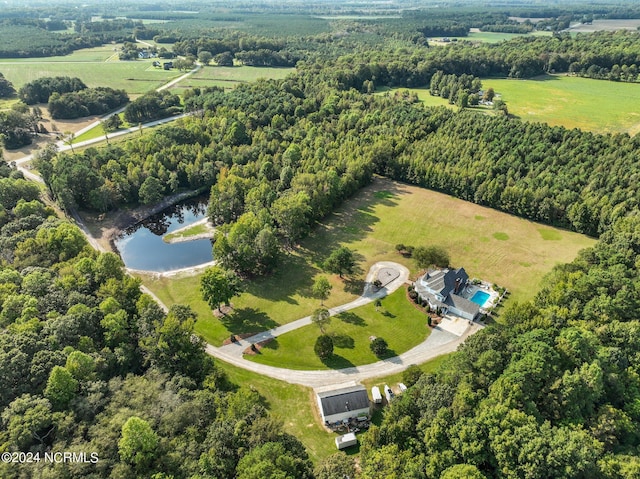 drone / aerial view with a rural view and a water view