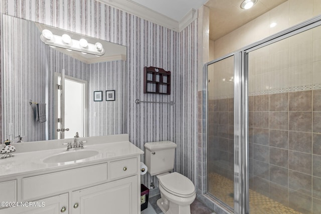 bathroom featuring a stall shower, toilet, and wallpapered walls