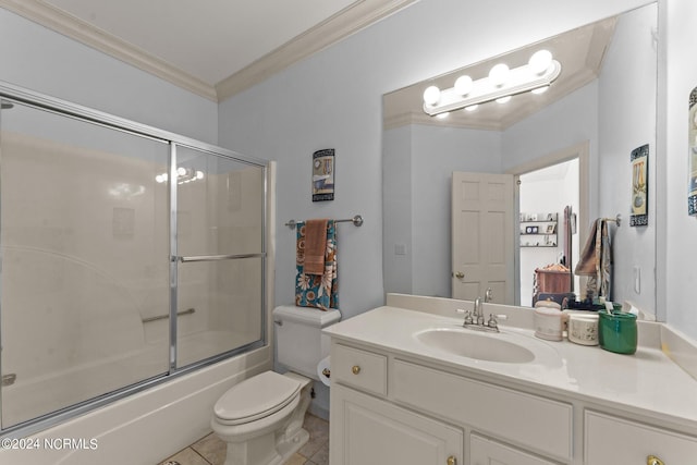 full bath featuring toilet, tile patterned floors, combined bath / shower with glass door, crown molding, and vanity