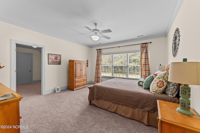 bedroom featuring crown molding, visible vents, light carpet, ceiling fan, and baseboards