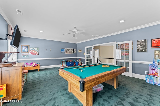 playroom with carpet floors, visible vents, and crown molding