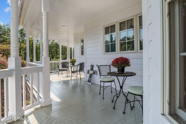 wooden terrace with covered porch