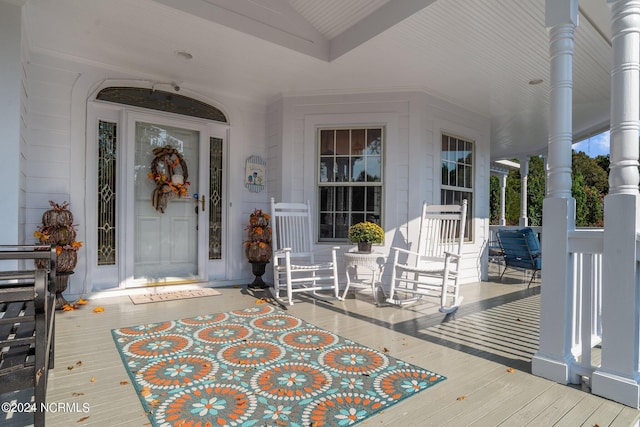 doorway to property with a porch