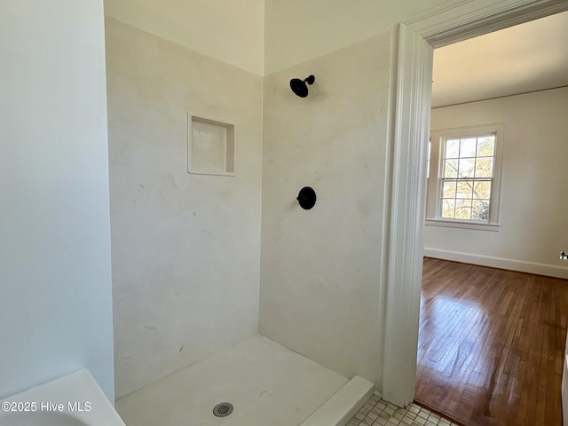 bathroom featuring walk in shower