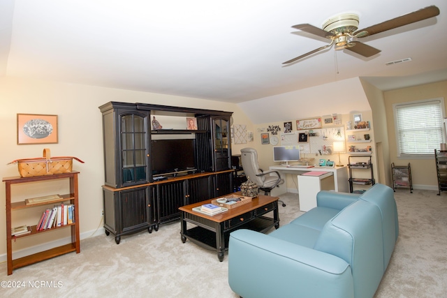 living room featuring ceiling fan, light carpet, baseboards, lofted ceiling, and visible vents