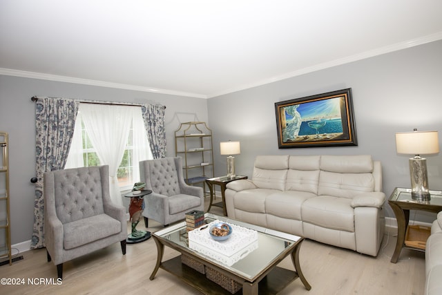 living area featuring crown molding, baseboards, wood finished floors, and visible vents
