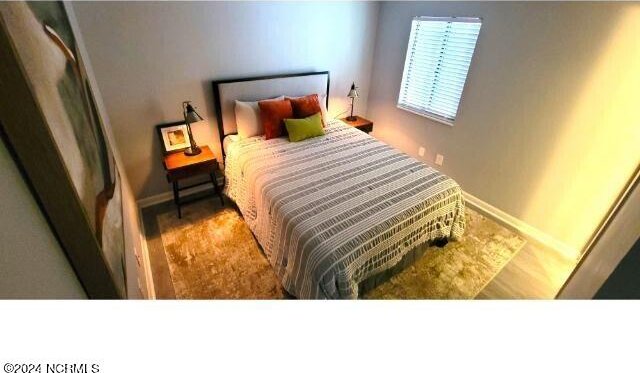 10166 Beach Dr SW Unit 5306, Calabash, NC 28467 - bedroom with baseboards