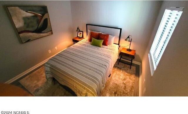 10166 Beach Dr SW Unit 5306, Calabash, NC 28467 - bedroom featuring baseboards