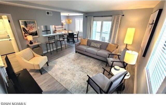 10166 Beach Dr SW Unit 5306, Calabash, NC 28467 - living area featuring wood finished floors