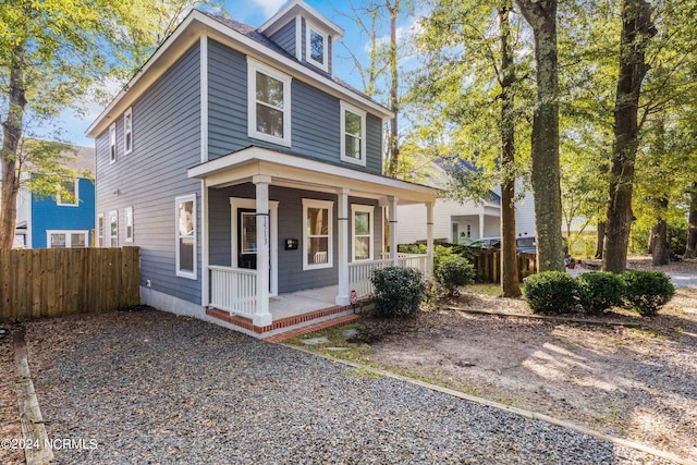 view of property with covered porch