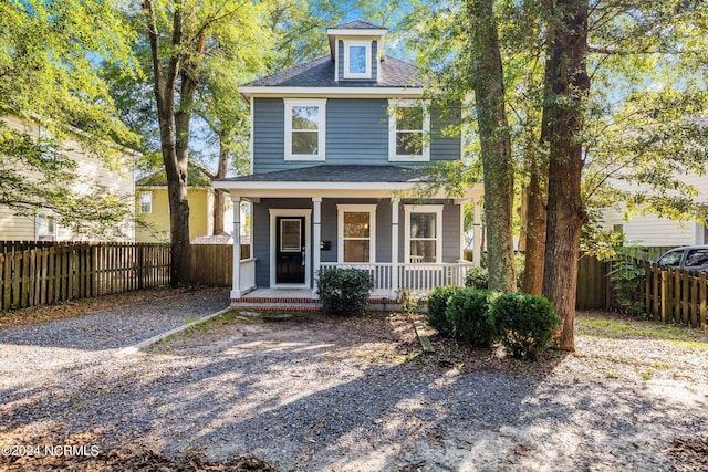 view of property with covered porch