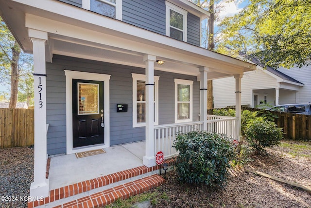 doorway to property featuring a porch