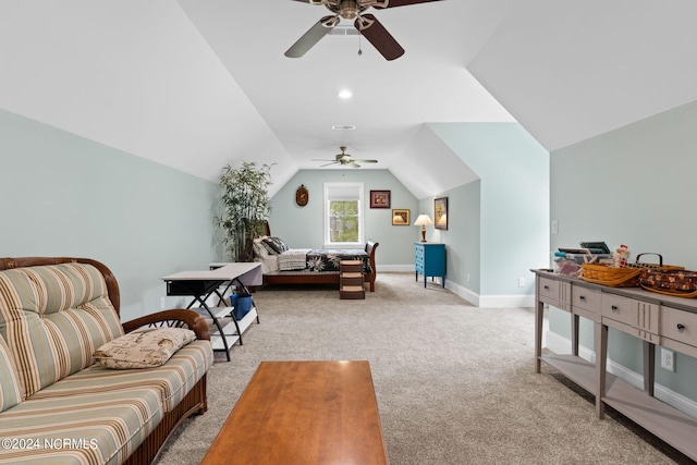 living room featuring lofted ceiling, ceiling fan, and light colored carpet