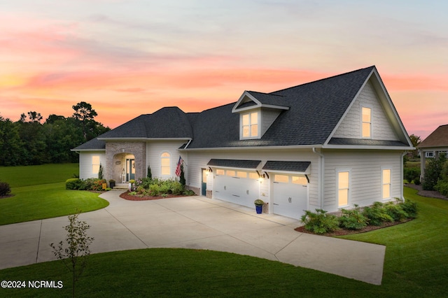 view of front of house with a yard