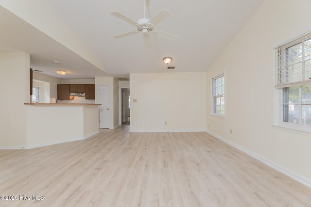 unfurnished bedroom with a closet, light colored carpet, and vaulted ceiling