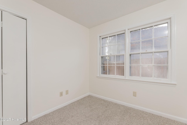 empty room with carpet floors