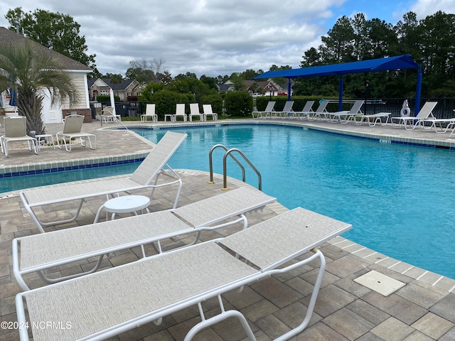 view of swimming pool featuring a patio