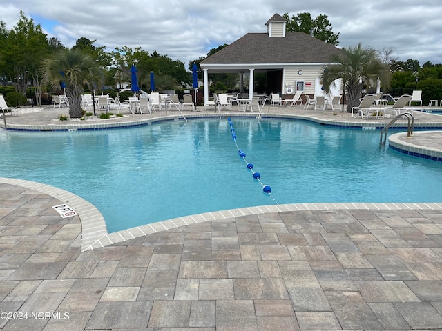 view of pool with a patio area