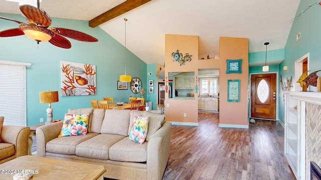 1514 Carolina Beach Ave N Unit 1 & 2, Carolina Beach, NC 28428 - living area with ceiling fan, wood finished floors, high vaulted ceiling, beamed ceiling, and baseboards