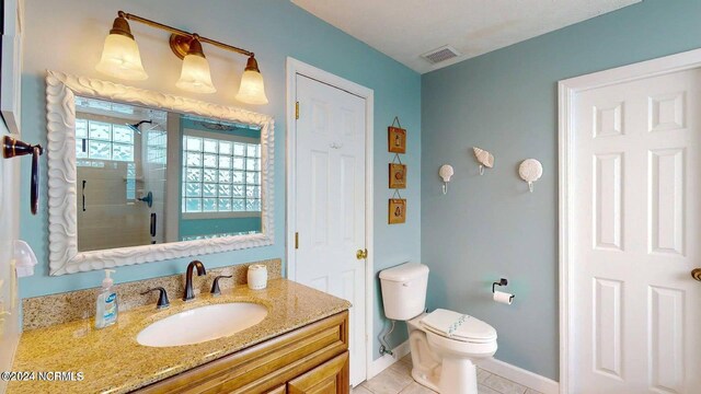 bathroom featuring plenty of natural light, independent shower and bath, and a textured ceiling