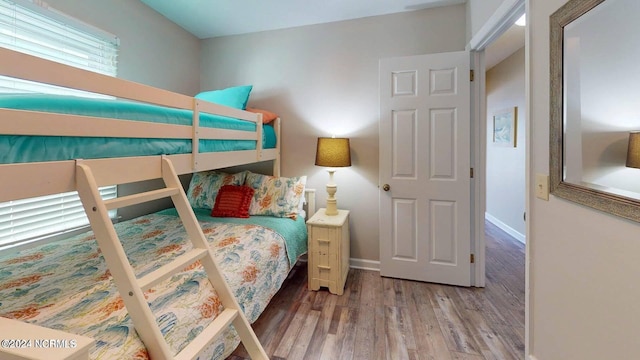 1514 Carolina Beach Ave N Unit 1 & 2, Carolina Beach, NC 28428 - bedroom with wood finished floors and baseboards