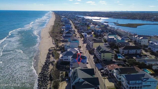 aerial view featuring a water view and a view of the beach