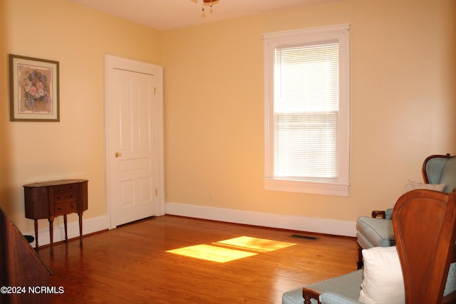 living area with wood-type flooring