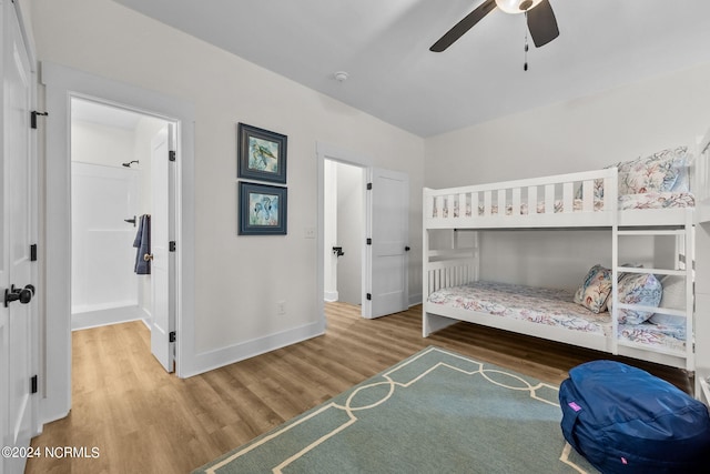 bedroom with ceiling fan and hardwood / wood-style flooring