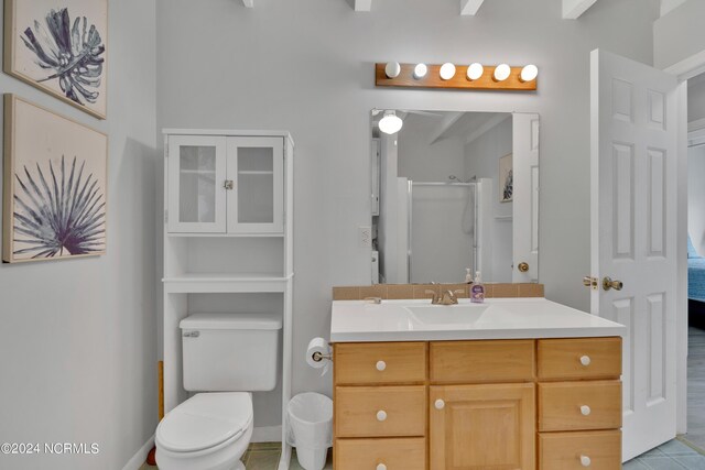 bathroom with vanity and an enclosed shower